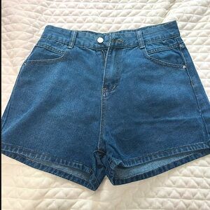 Size small. Blue high waisted shorts.